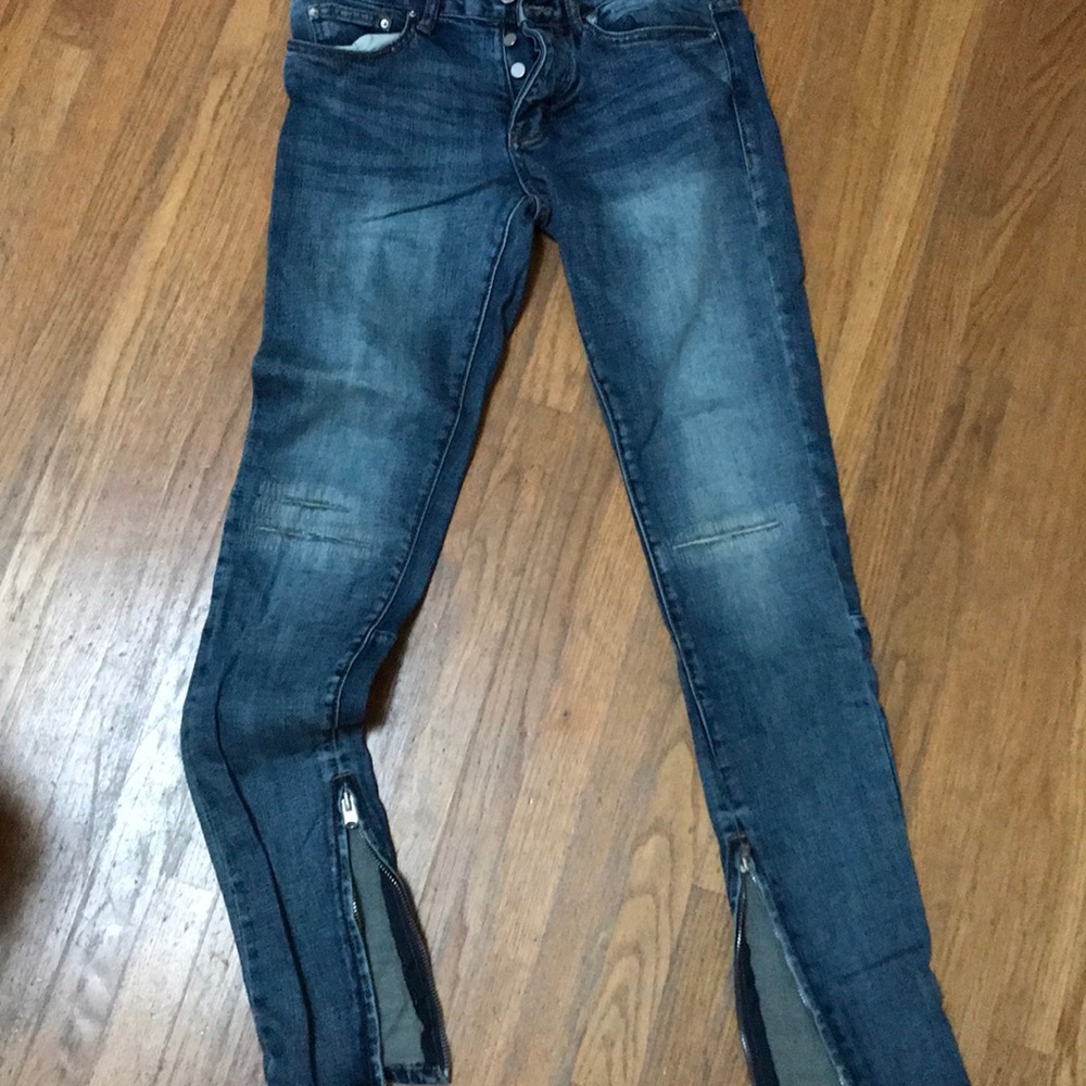 Dark washed ripped jeans